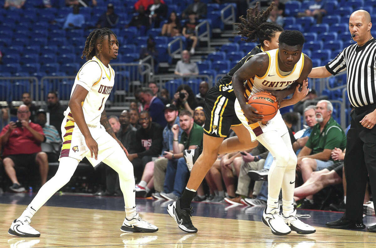 Beaumont United's Trealyn Porchia goes for the steal as they take on Brennan in the 6A state semi final at the Alamodome Friday. Photo made Friday, March 10, 2023 Kim Brent/Beaumont Enterprise