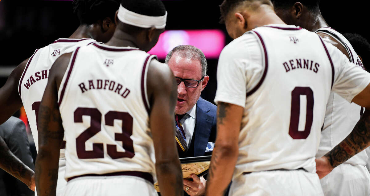 Buzz Williams of the Texas A&M Aggies coaching his team in a timeout in the first half during the quarterfinals against the Arkansas Razorbacks of the 2023 SEC Men's Basketball Tournament at Bridgestone Arena on March 10, 2023 in Nashville, Tennessee. (Photo by Carly Mackler/Getty Images)