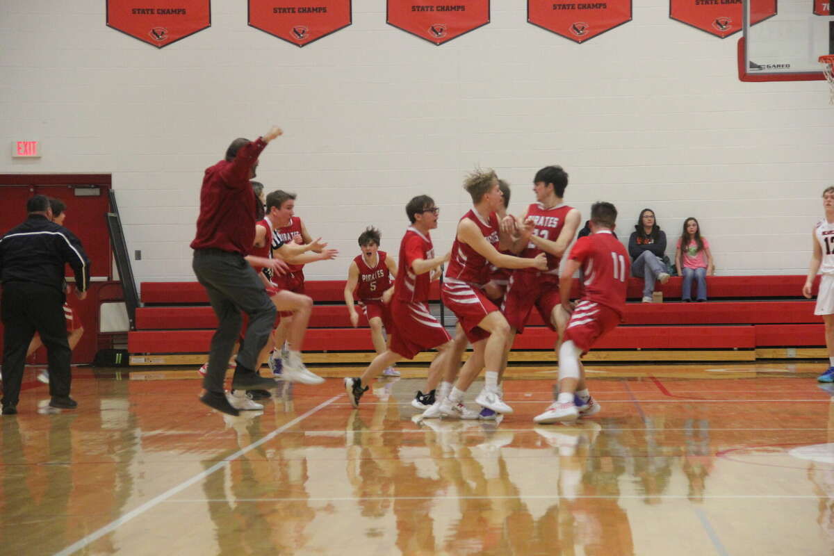 The Peck Pirates are district champs after a buzzer-beating putback shot gave them a 38-37 victory over the Ubly Bearcats. 