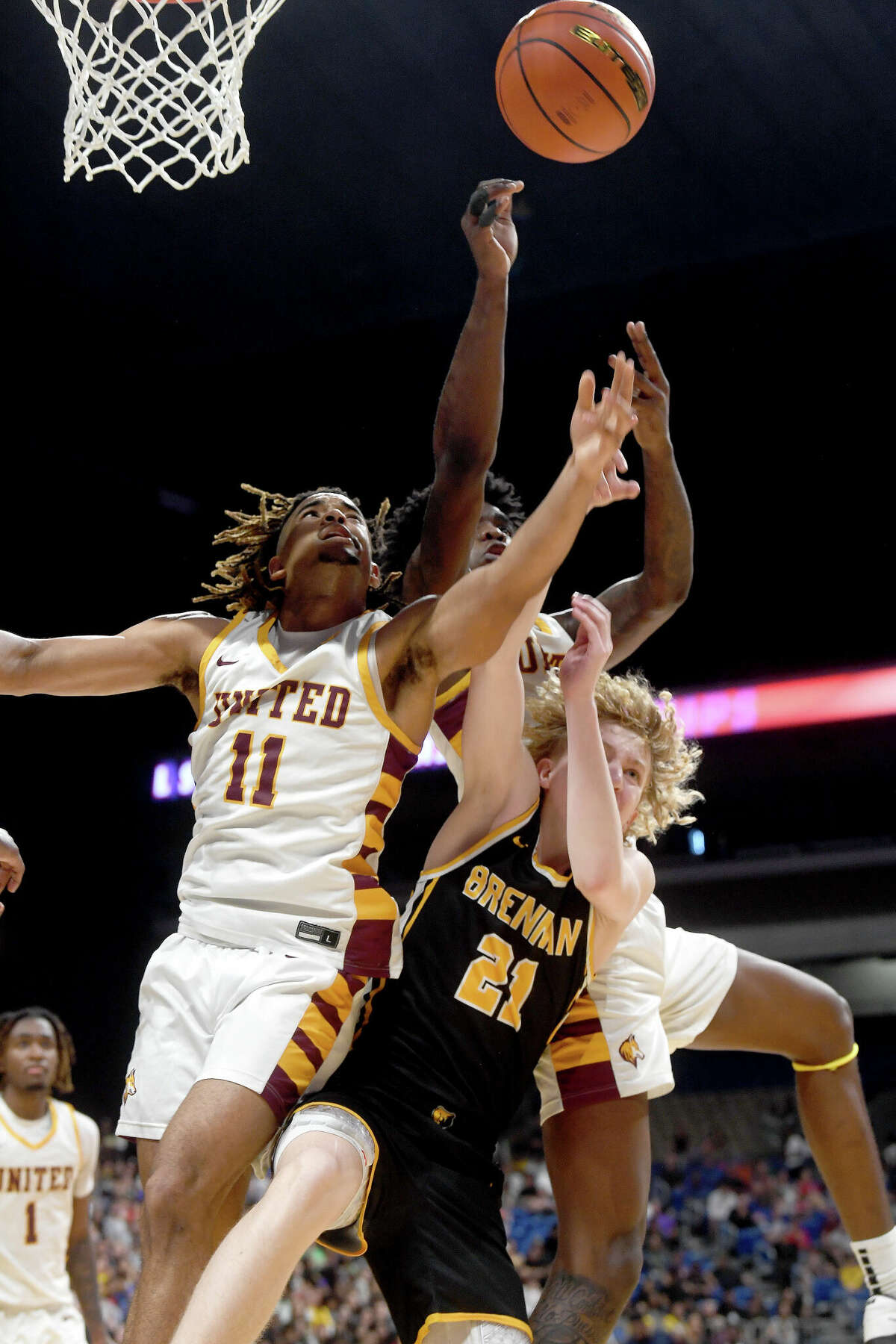Beaumont United's Kayde Dotson battles for the rebound as the Timberwolves take on Brennan in the 6A state semi final at the Alamodome Friday. Photo made Friday, March 10, 2023 Kim Brent/Beaumont Enterprise
