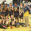 Baldwin's boys basketball team celebrated a district title on Friday.