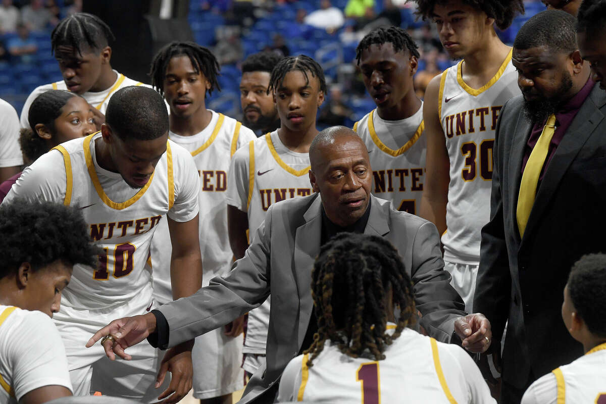 Coach David Green instructs players during a time out as Beaumont United takes on Brennan in the 6A state semi final at the Alamodome Friday. Photo made Friday, March 10, 2023 Kim Brent/Beaumont Enterprise
