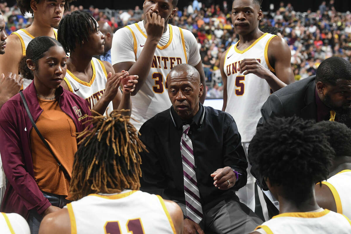 Coach David Green instructs during a time out as Beaumont United takes on Brennan in the 6A state semi final at the Alamodome Friday. Photo made Friday, March 10, 2023 Kim Brent/Beaumont Enterprise