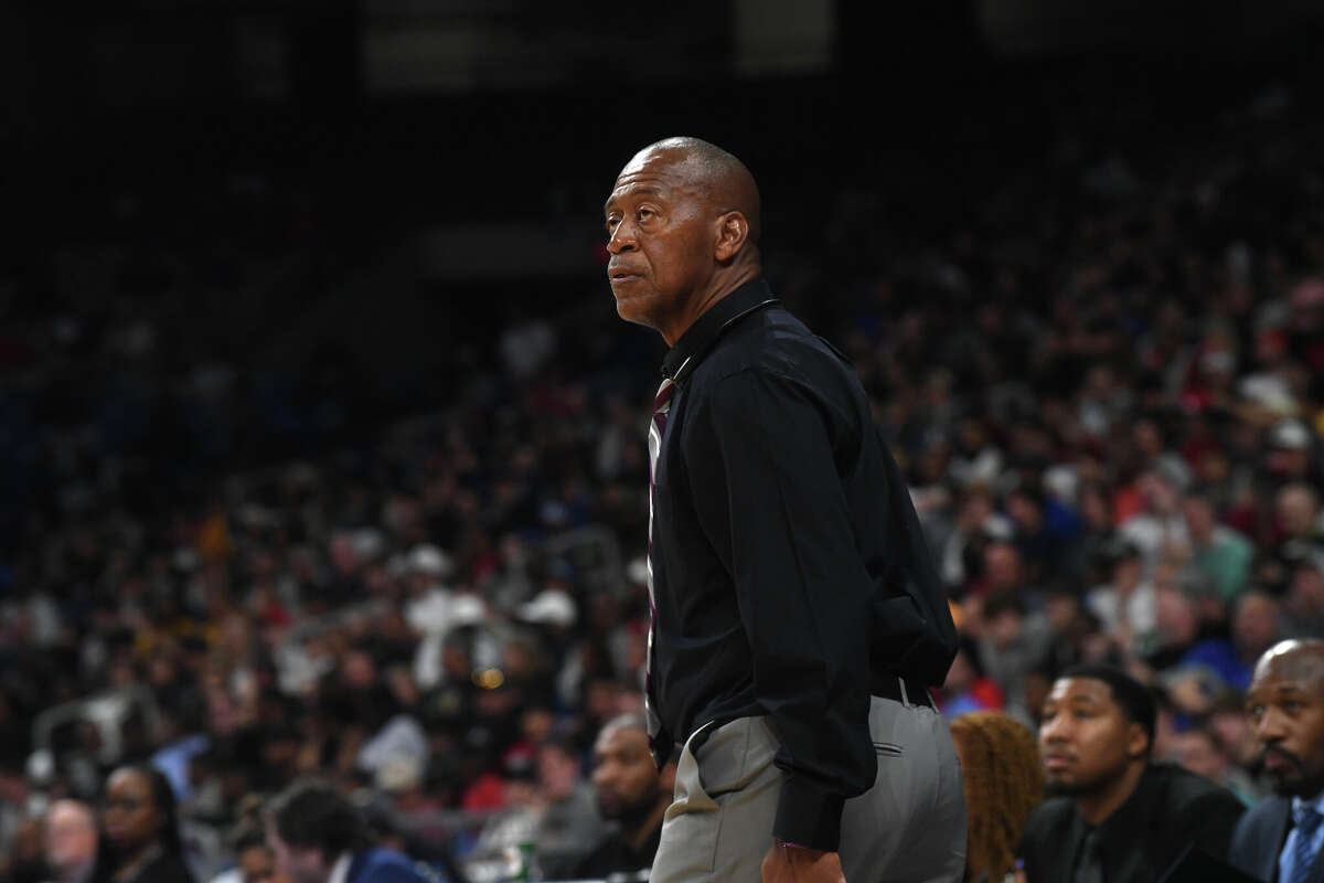 Coach David Green takes in the game action as Beaumont United takes on Brennan in the 6A state semi final at the Alamodome Friday. Photo made Friday, March 10, 2023 Kim Brent/Beaumont Enterprise