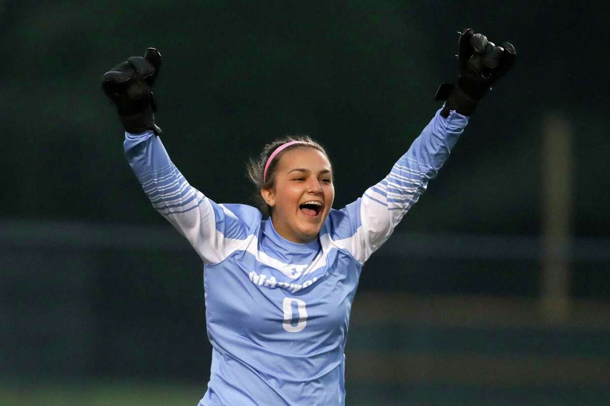 Magnolia goalie Anne-Marie Cabello cheers as she is taken off the field for her honorary start during a District 21-5A high school soccer match at Magnolia West High School, Friday, March 10, 2023, in Magnolia. Cabello, a Lamar signee, was diagnosed in December with moderate aplastic anemia, a type of bone marrow failure.