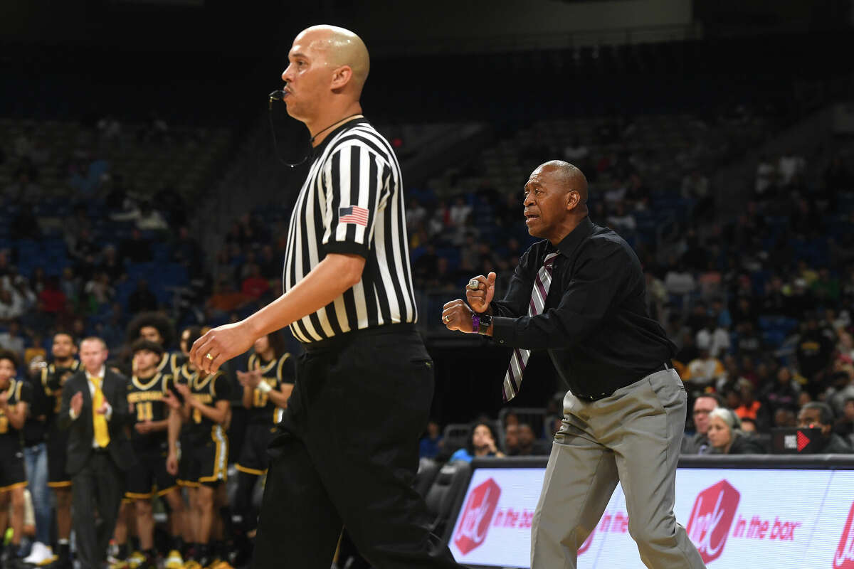 Beaumont United shouts to players as they battle Brennan in the 6A state semi final at the Alamodome Friday. Photo made Friday, March 10, 2023 Kim Brent/Beaumont Enterprise