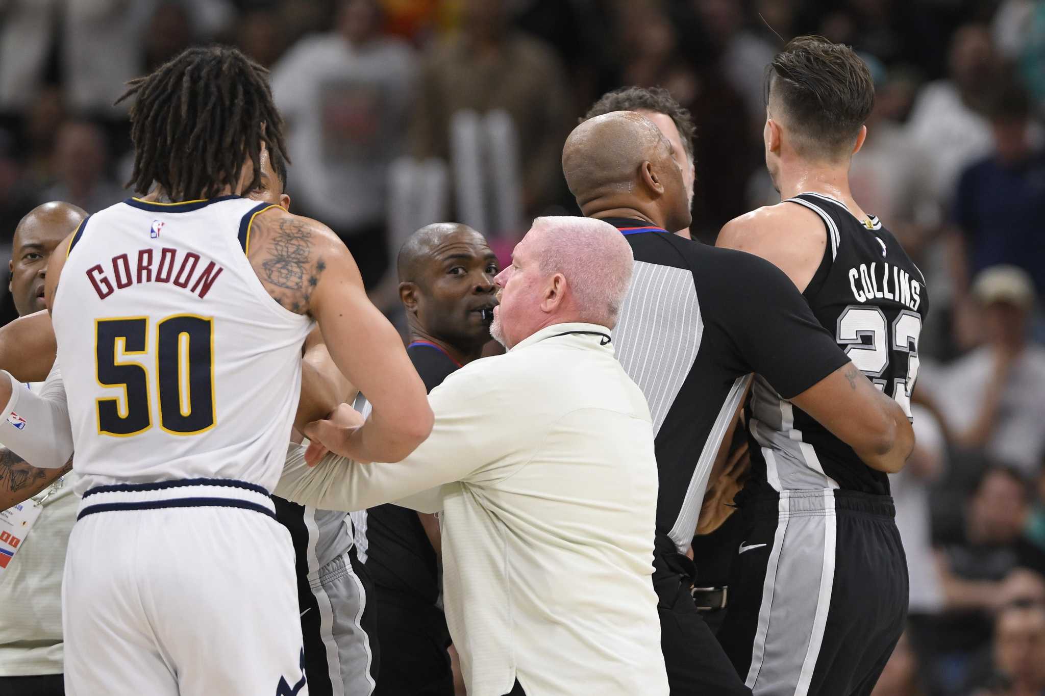 Michael Porter Jr grabs Zach Collins by neck during altercation