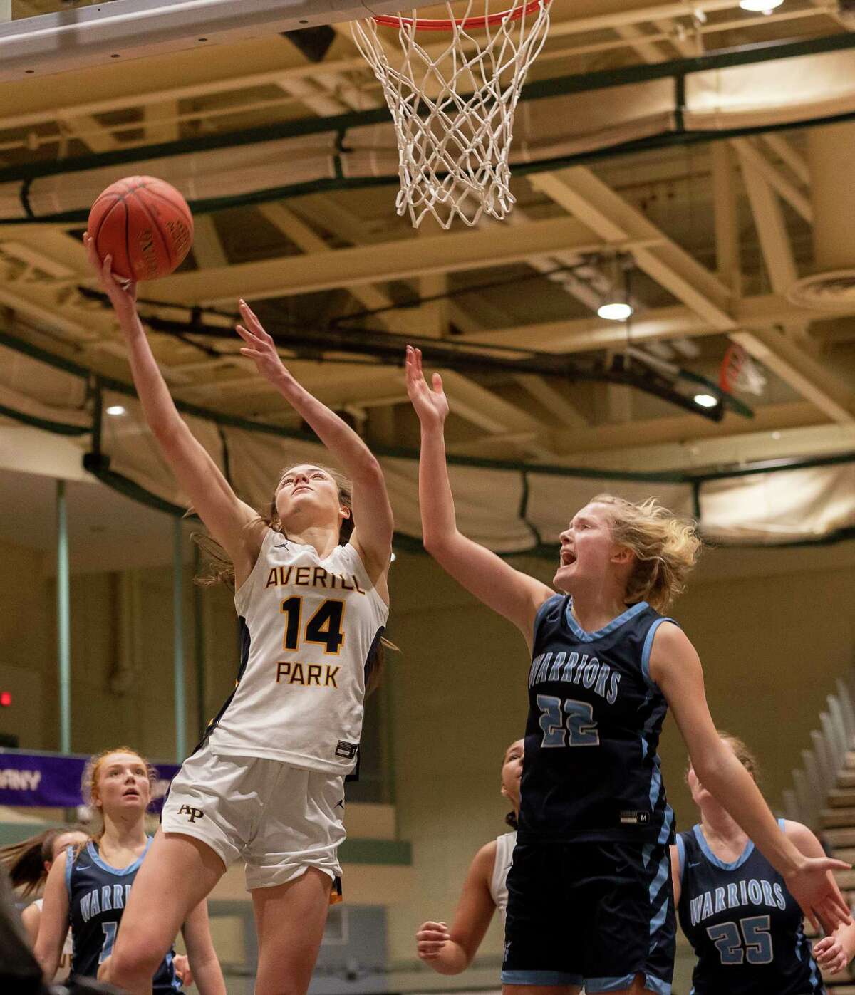 Averill Park’s Taylor Holohan shoots the ball as Indian River’s Allison LaMora defends during the Class A state quarterfinal at McDonough Sports Complex in Troy, N.Y. on Saturday, Mar. 11, 2023. (Jenn March, Special to the Times Union)