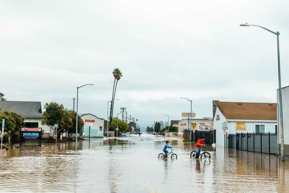 See drone video of Pajaro flowing through levee, devastating flooding