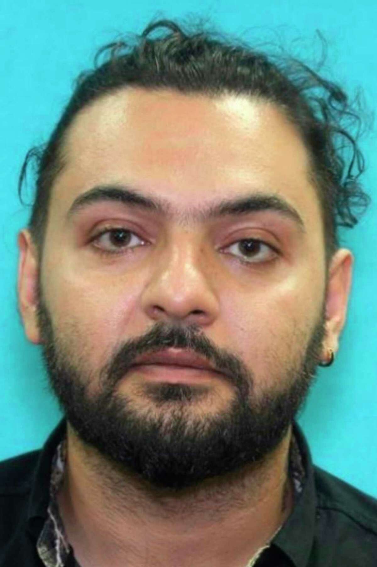This undated photo released by the Redmond Police Department shows Ramin Khodakaramrezaei, 38. The longhaul truck driver from Texas who became obsessed with a software engineer after meeting her through a social media chatroom app killed her, her husband and himself in Redmond, Wash., after stalking them for months, police said. (Redmond Police Departemnet via AP)