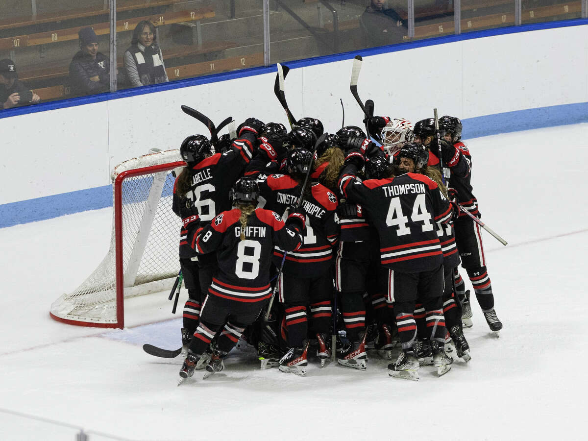 Northeastern celebrates its 4-1 victory over Yale on Saturday, March 11, 2023 to advance to the NCAA Women's Ice Hockey Frozen Four. 
