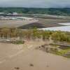 水流通过破堤的Pajaro河淹没了Pajaro城市中心周六,3月11日,在加州Pajaro 2023。