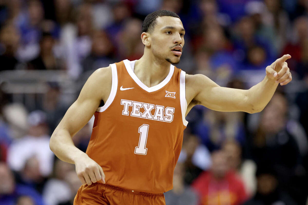 Dylan Disu was named the most outstanding player in the Big 12 tournament as Texas beat Kansas in the title game.