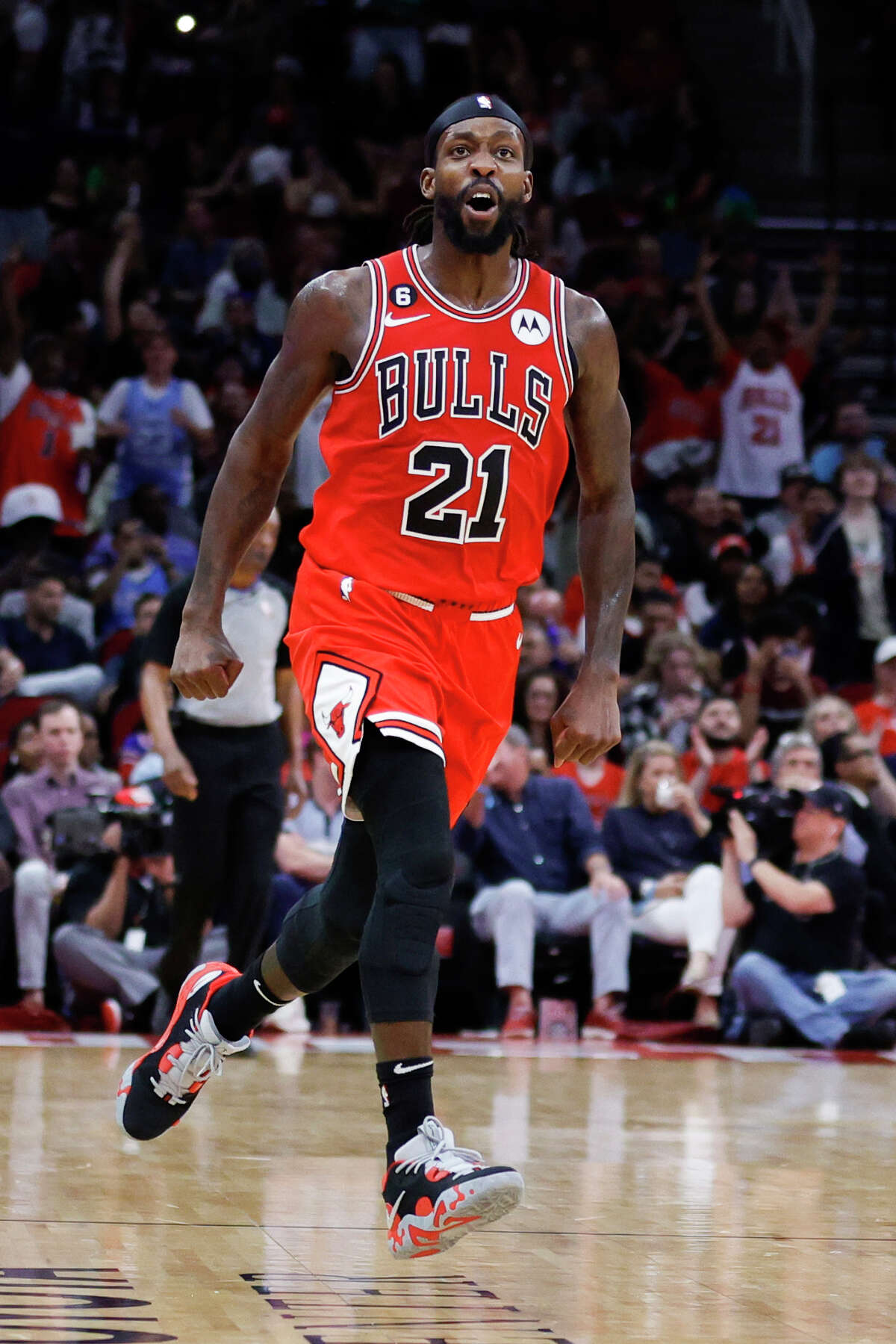 HOUSTON, TEXAS - MARCH 11: Patrick Beverley #21 of the Chicago Bulls reacts to hitting a three point basket against the Houston Rockets during the second half at Toyota Center on March 11, 2023 in Houston, Texas. NOTE TO USER: User expressly acknowledges and agrees that, by downloading and or using this photograph, User is consenting to the terms and conditions of the Getty Images License Agreement. (Photo by Carmen Mandato/Getty Images)