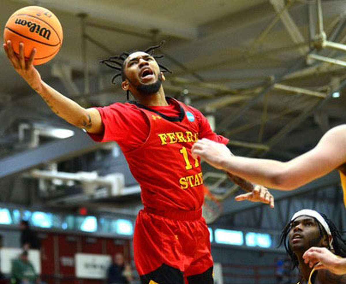 Ferris' Solomon Oraegbu goes. to the basket against Ashland on Saturday in NCAA Division II regional tournament action