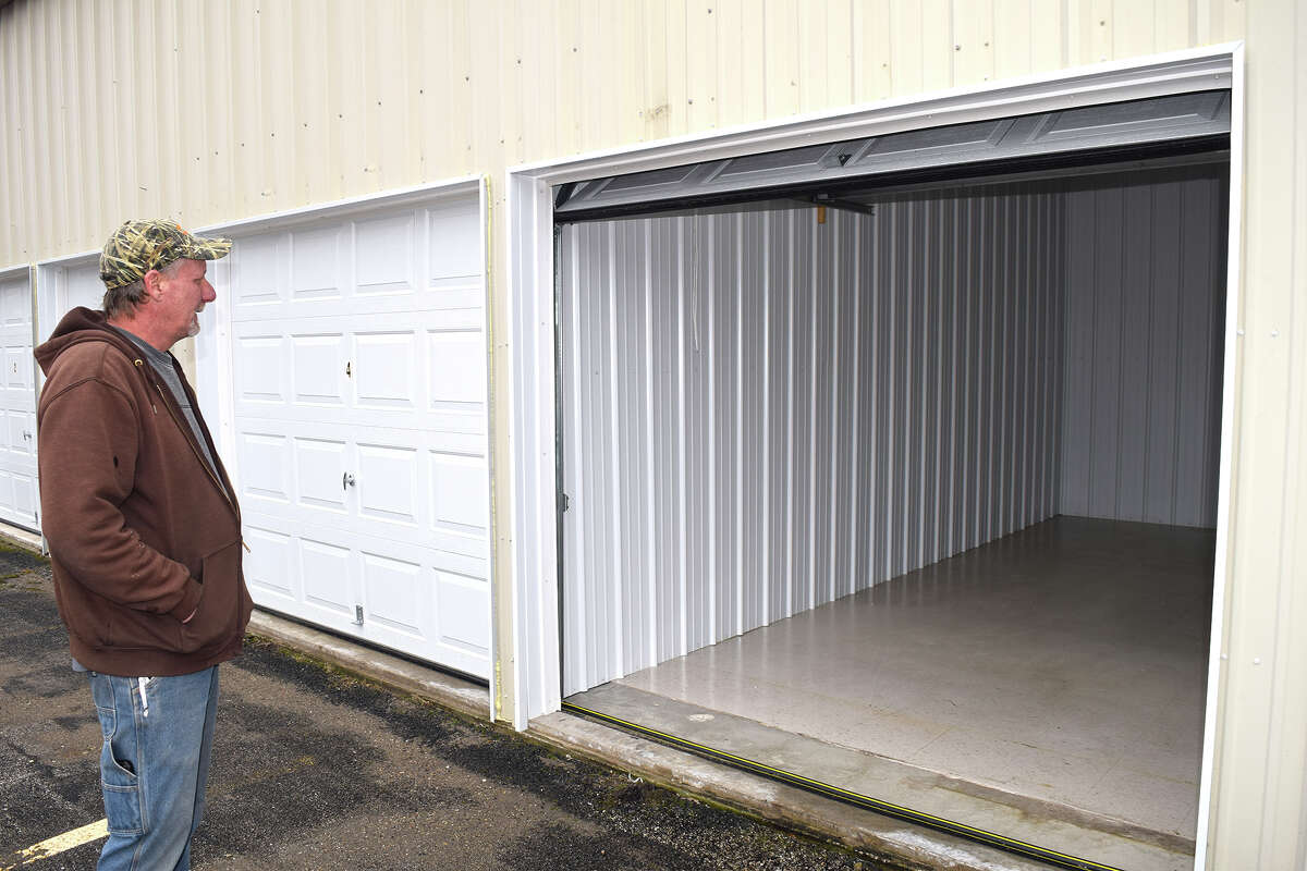 Mark Tipsord stands outside one of the climate-controlled storage units at the former Dollar General store in Winchester.