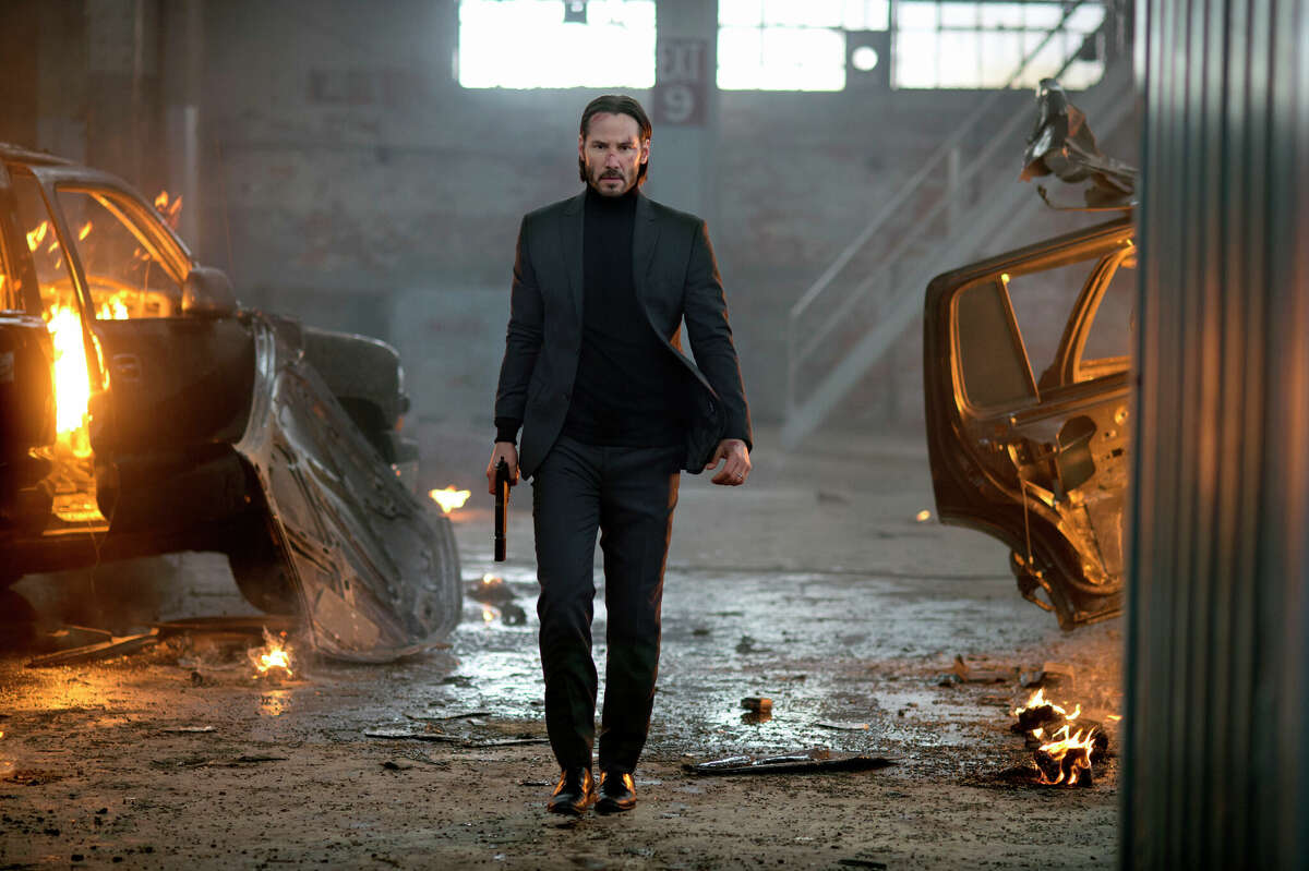  Keanu Reeves doesn't suffer fools (or cars, apparently) in "John Wick." 