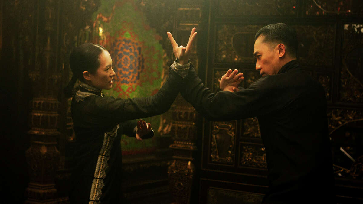  Ziyi Zhang, left, and Tony Leung Chiu Wai in "The Grandmaster." 