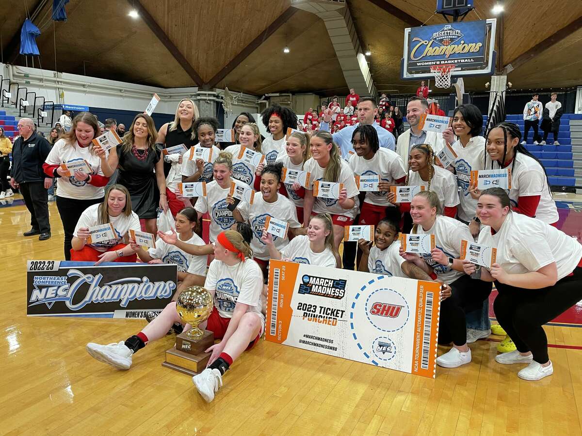 Members of the Sacred Heart University women's basketball team celebrate after defeating Fairleigh Dickinson in the Northeast Conference championship game Sunday. Sacred Heart earned its first NCAA tournament berth since 2012 and fourth overall with the win. The Pioneers learn their NCAA opponent Sunday night.