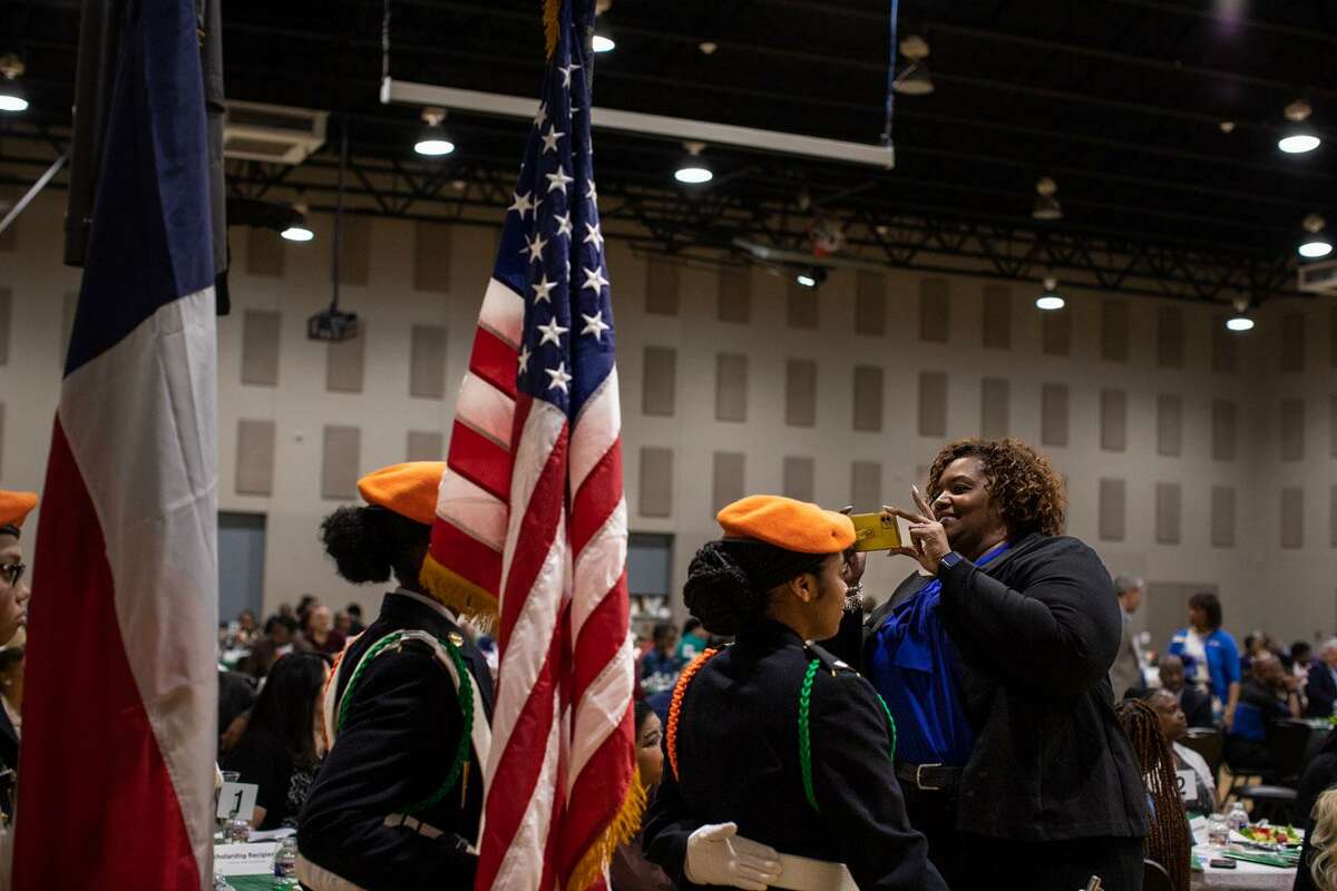 The Sam Houston High School JROTC presents the colors at the Friends of Sam Houston High School annual community scholarship breakfast at the Second Baptist Church Community Center on Saturday morning. (Kaylee Greenlee Beal/Contributor)
