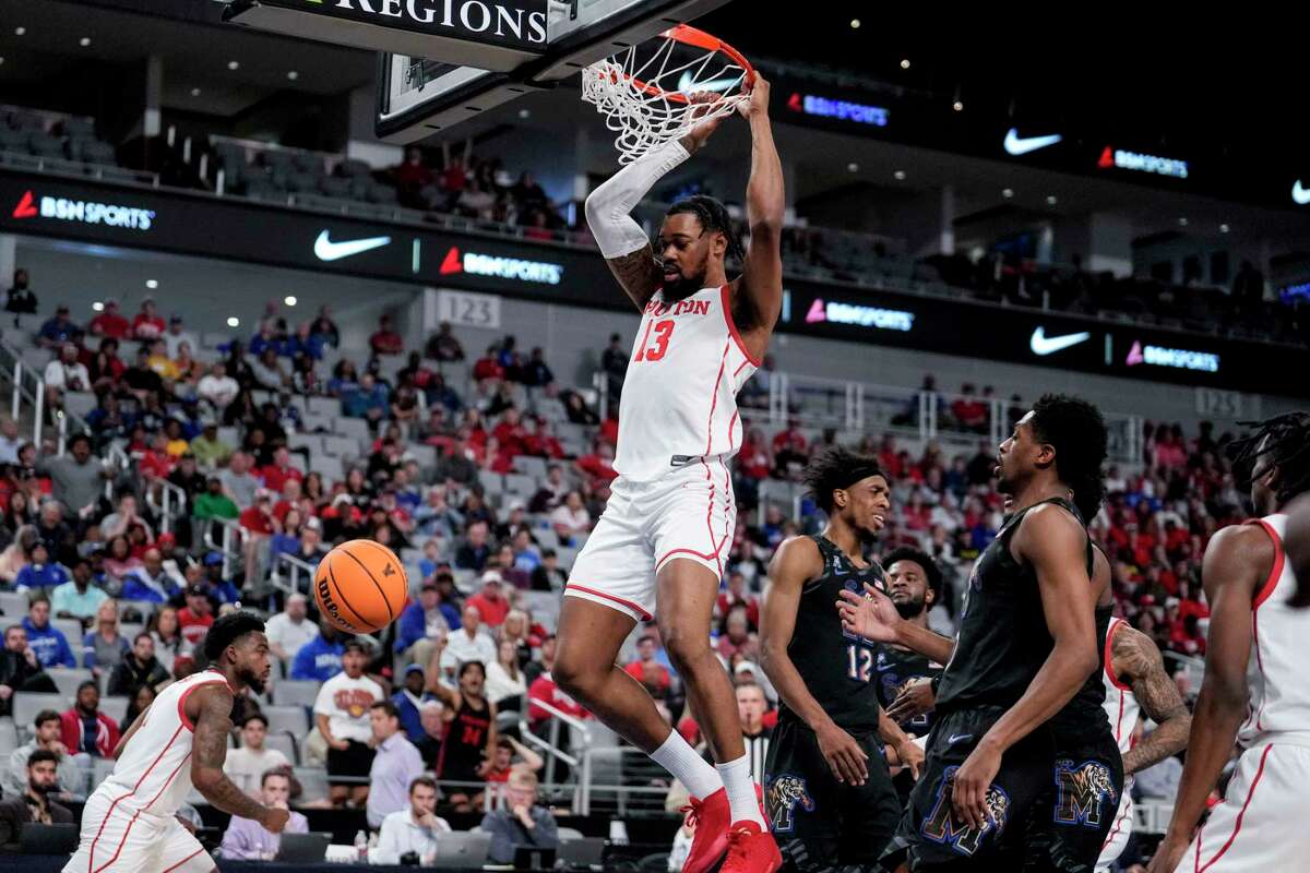 Houston forward J'Wan Roberts (13) dunks against Memphis during the first half of the American Athletic Conference men's basketball tournament championship game on Sunday, March 12, 2023, in Fort Worth.