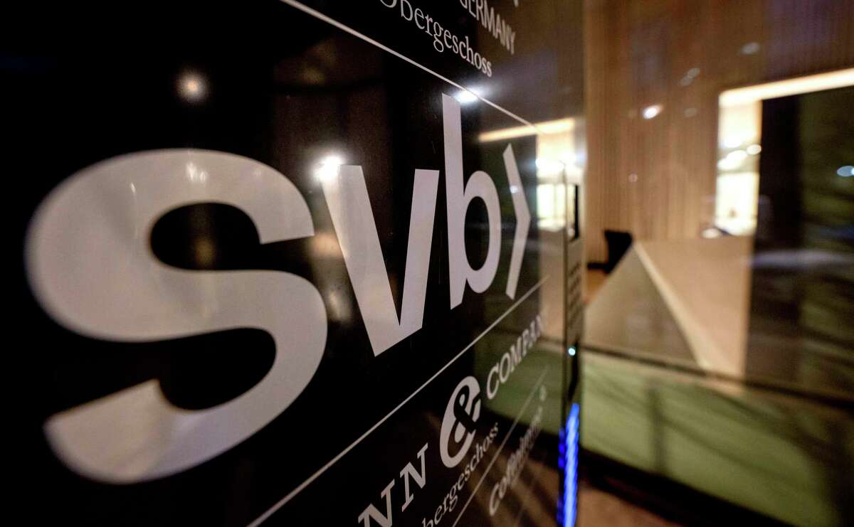 A sign of a branch of Silicon Valley Bank is pictured at an office building in Frankfurt, Germany, on Sunday, March 12, 2023.