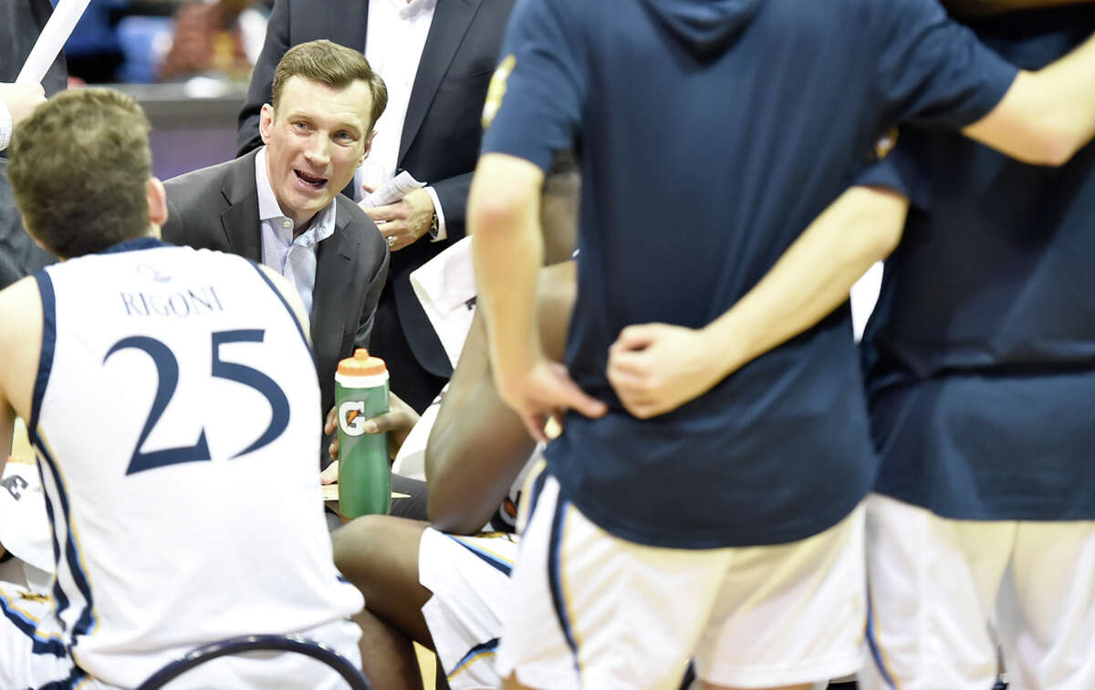 Hamden, Connecticut - January 24, 2020: Quinnipiac University mens basketball coach Baker Dunleavy with his team during second half basketball against Fairfield University Friday at Quinnipiac in Hamden.