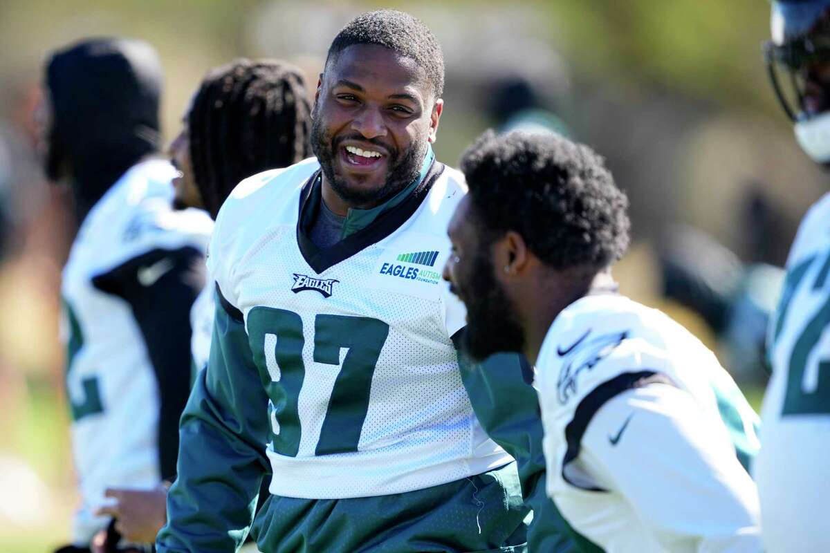 Philadelphia Eagles defensive tackle Javon Hargrave (97) laughs during an NFL football Super Bowl team practice, Friday, Feb. 10, 2023, in Tempe, Ariz. The Eagles will face the Kansas City Chiefs in Super Bowl 57 Sunday. (AP Photo/Matt York)