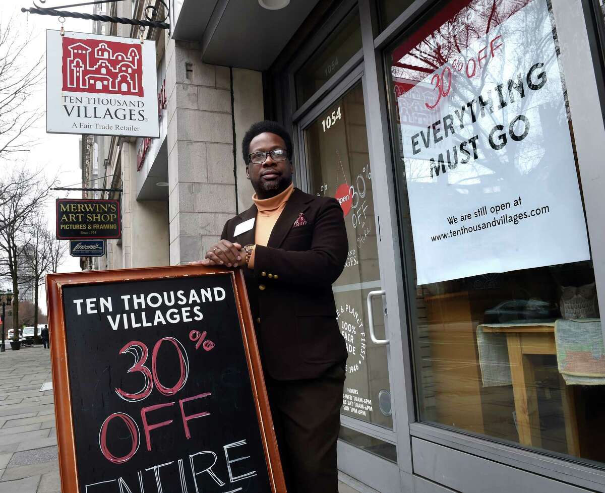Ten Thousand Villages store manager Shaams Ashiq is photographed outside of the store on Chapel Street in New Haven during a store closing sale on March 13, 2023.