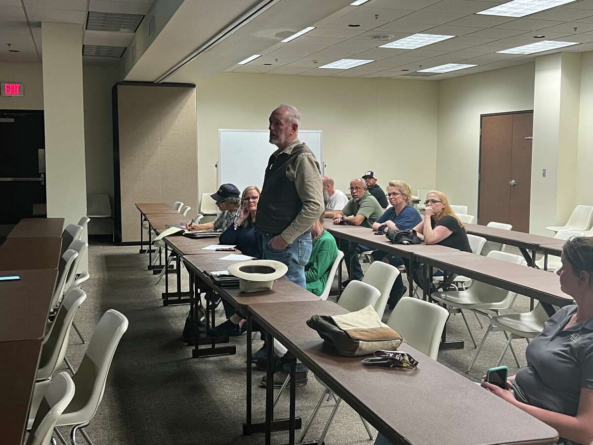 Community members speak at a public meeting held by the Texas Commission on Environmental Quality Feb. 28.