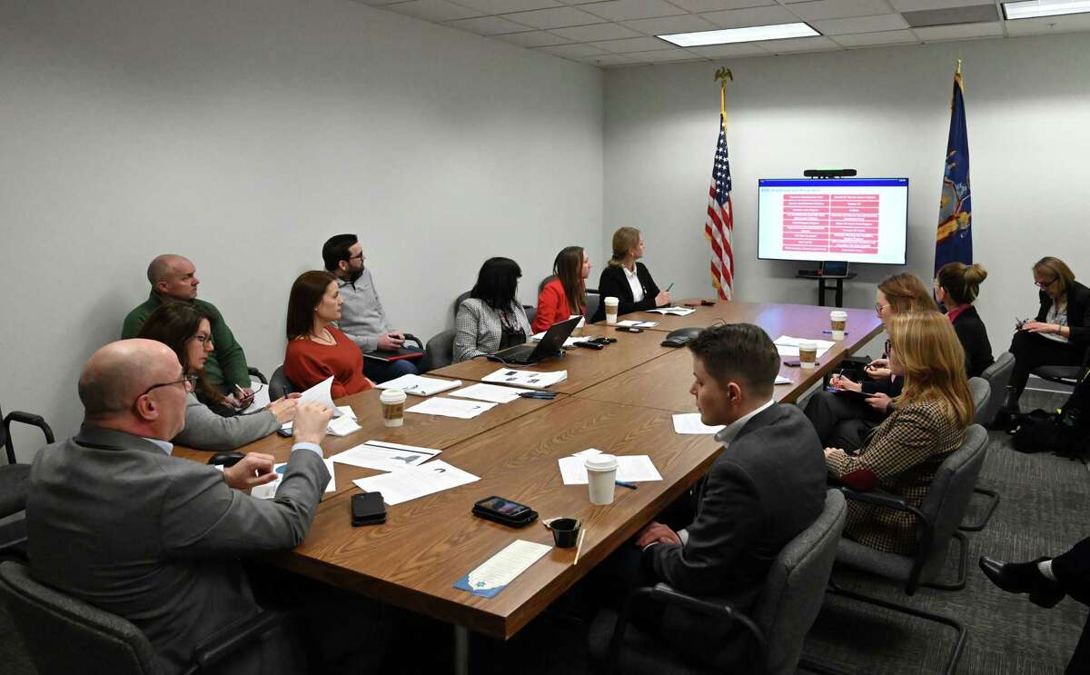 Michael Yevoli, regional director for Empire State Development Capital Region, left, welcomes an all-women delegation from Poland, far right, to discuss women in entrepreneurship and highlight the important and powerful women in the Capital Region on Monday, March 13, 2023, at the ESD offices at Hedley Park Place in Troy, N.Y.
