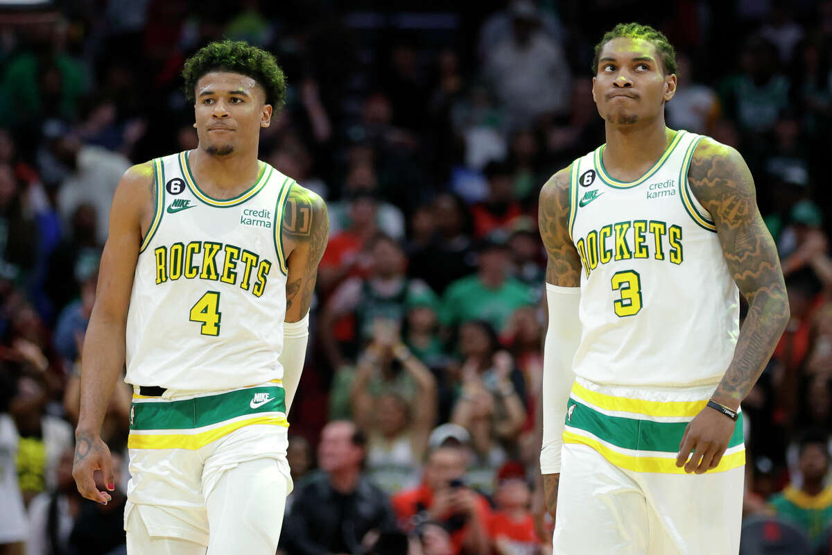 HOUSTON, TEXAS - MARCH 13: Kevin Porter Jr. #3 and Jalen Green #4 of the Houston Rockets look on against the Boston Celtics during the second half at Toyota Center on March 13, 2023 in Houston, Texas. NOTE TO USER: User expressly acknowledges and agrees that, by downloading and or using this photograph, User is consenting to the terms and conditions of the Getty Images License Agreement. (Photo by Carmen Mandato/Getty Images)