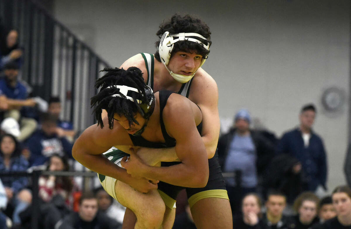 Avon wrestling claims Class M crown; Killingly wins Class S title