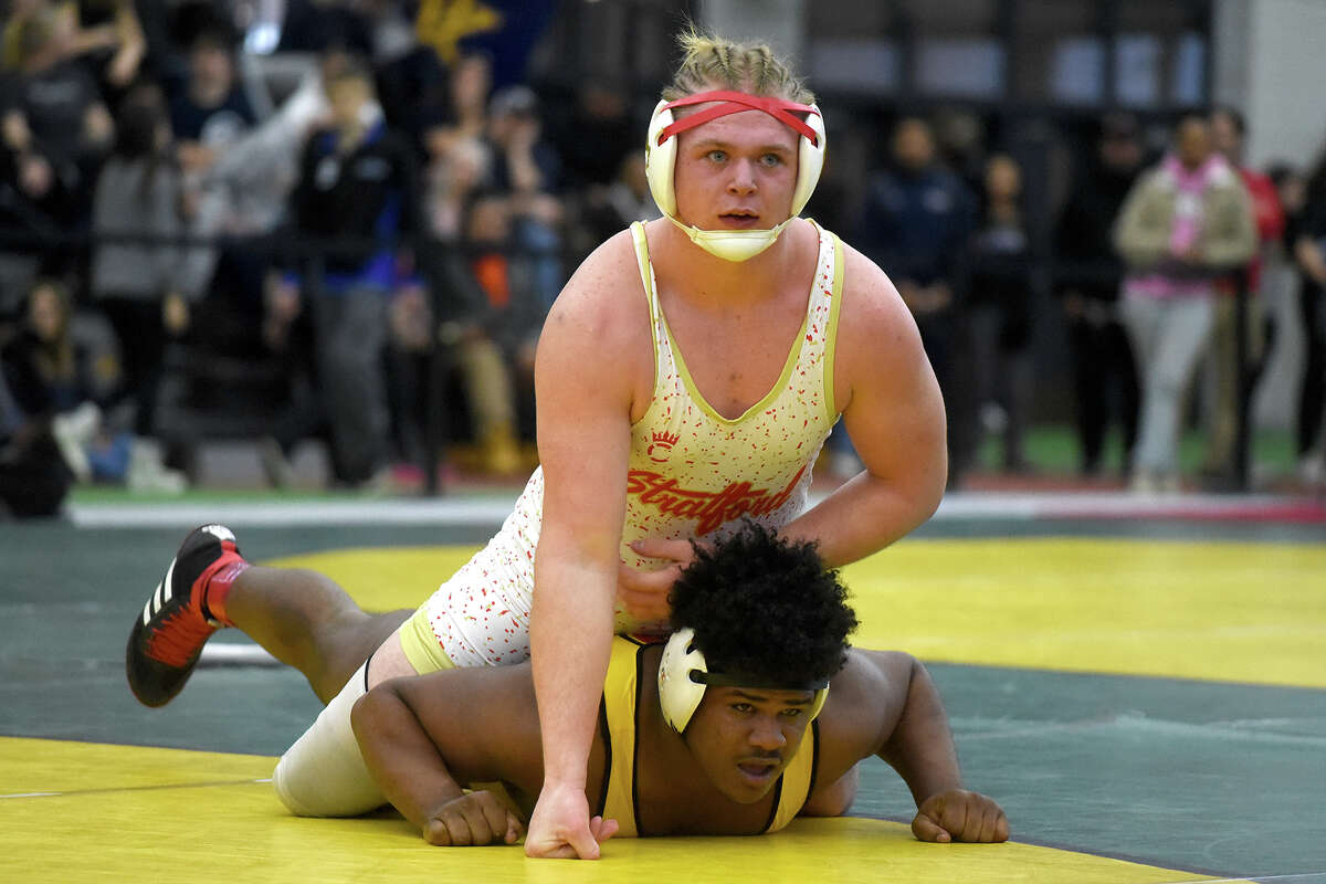 Avon wrestling claims Class M crown; Killingly wins Class S title