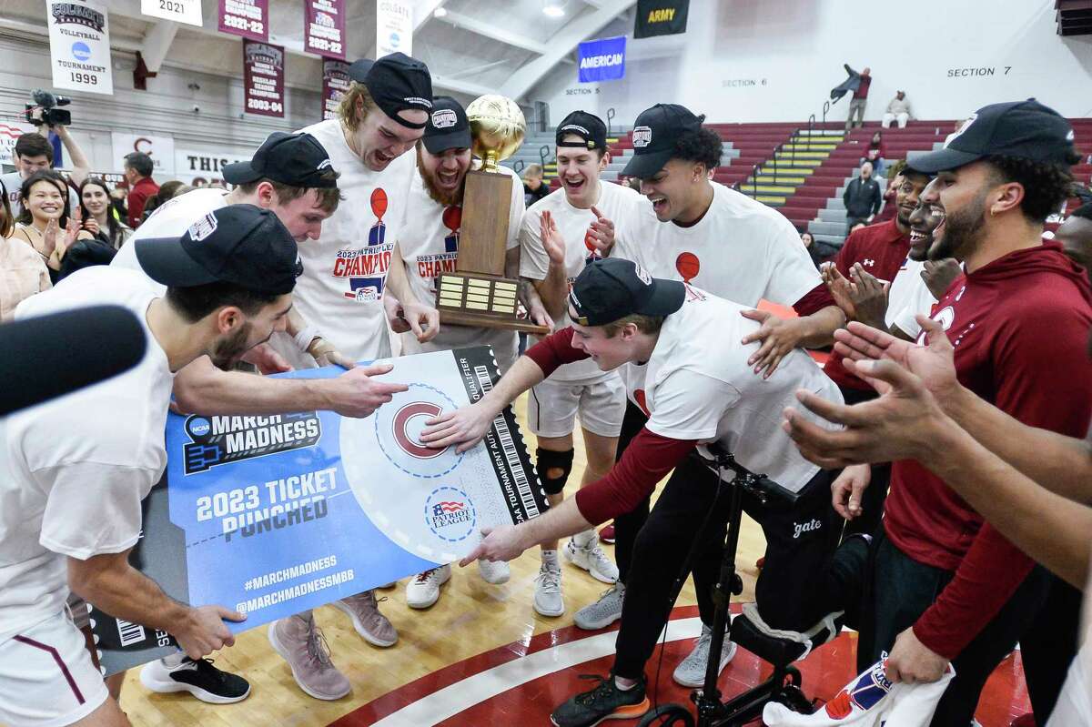Colgate players punch their ticket to the March Madness tournament after their win against Lafayette in an NCAA college basketball game for the Patriot League tournament championship in Hamilton, N.Y., Wednesday, March 8, 2023.