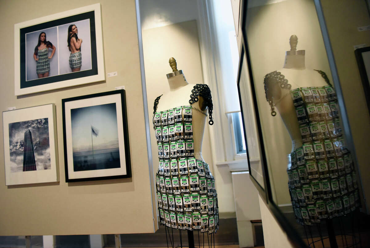 GHS senior Juliana Contadino's dress made from movie cans is on display in the K-12 Art Show at the Greenwich Public Schools District Art Show at the Bendheim Gallery of the Greenwich Arts Council in Greenwich, Connecticut, Monday, March 13, 2023. Work in Different Environments from Elementary to High School Students is on display at the gallery until March 26.