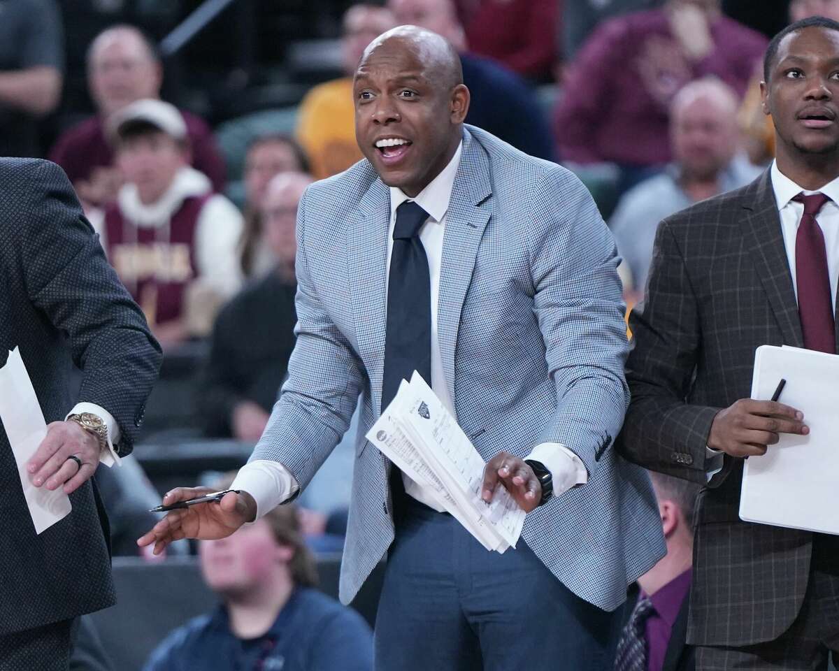 Taliek Brown is in his first year as an assistant coach on coach Rick Pitino's Iona staff. Brown was the starting point guard and captain on UConn's 2004 national championship team. Iona plays UConn in the first round of the NCAA Tournament Friday in Albany. 