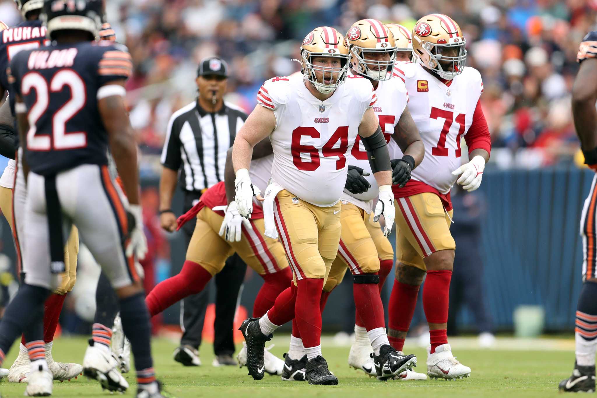 San Francisco 49ers center Jake Brendel heads to the locker room