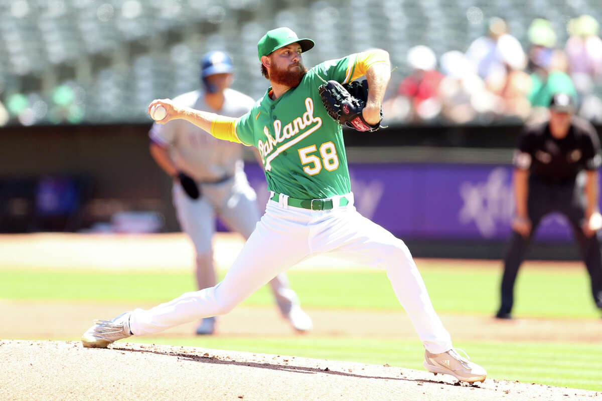 Oakland Athletics’ Paul Blackburn delivers in 1st inning against Texas Rangers during MLB game at Oakland Coliseum in Oakland, Calif., on Sunday, July 24, 2022.