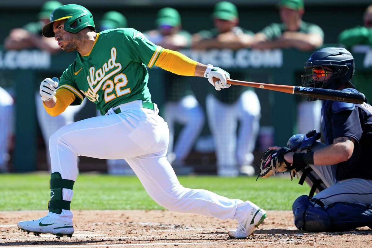 Oakland A's outfielder Ramon Laureano (22) hits against the Cleveland Guardians on March 4 in Mesa, Ariz.