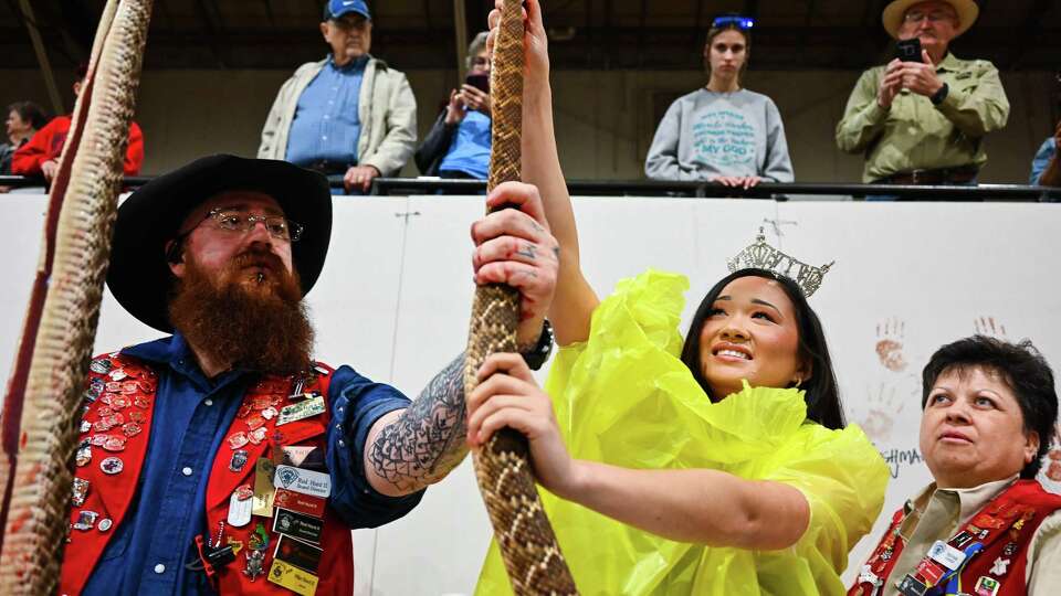 Miss Texas 2023, Averie Bishop guts a snake. On Saturday, March 11, 2023 in Sweetwater Texas. It has become a yearly tradition for Miss Texas to take part in the Round-up