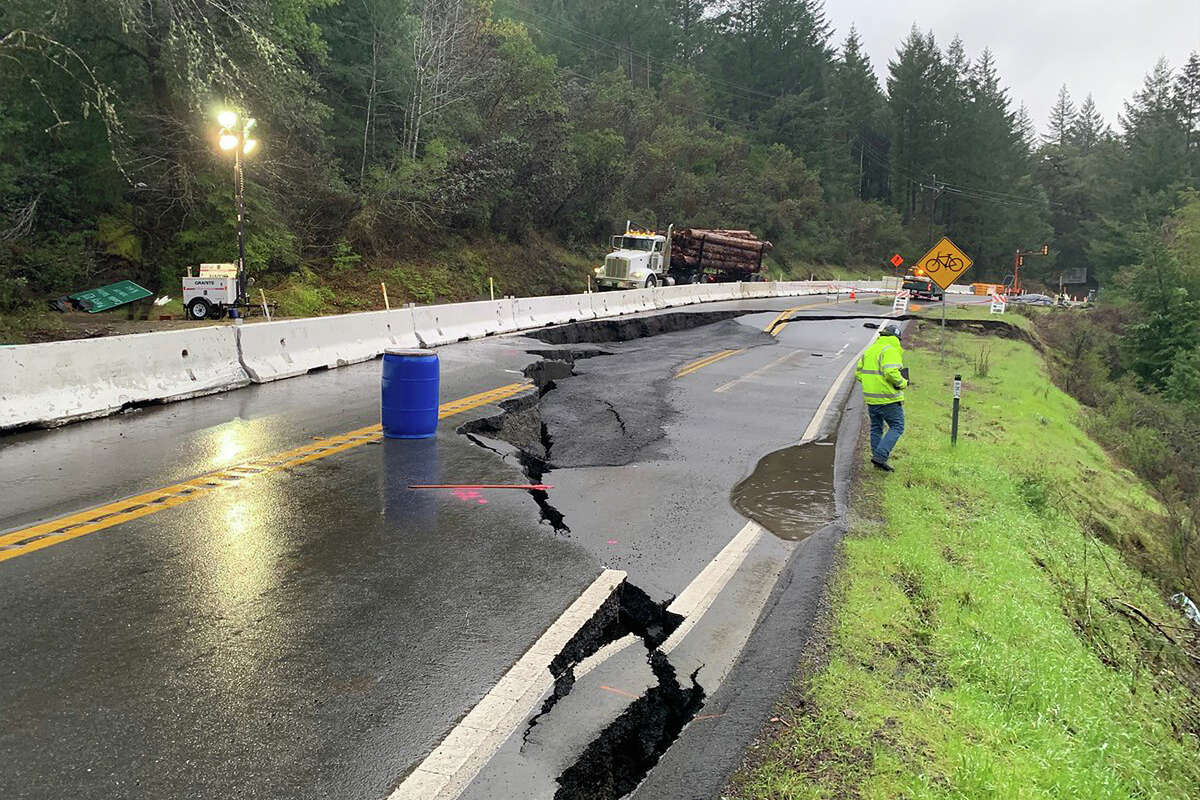 Caltrans monitors a portion of Highway 101 damaged by recent storms near Cooks Valley in southern Humboldt in March 2023.