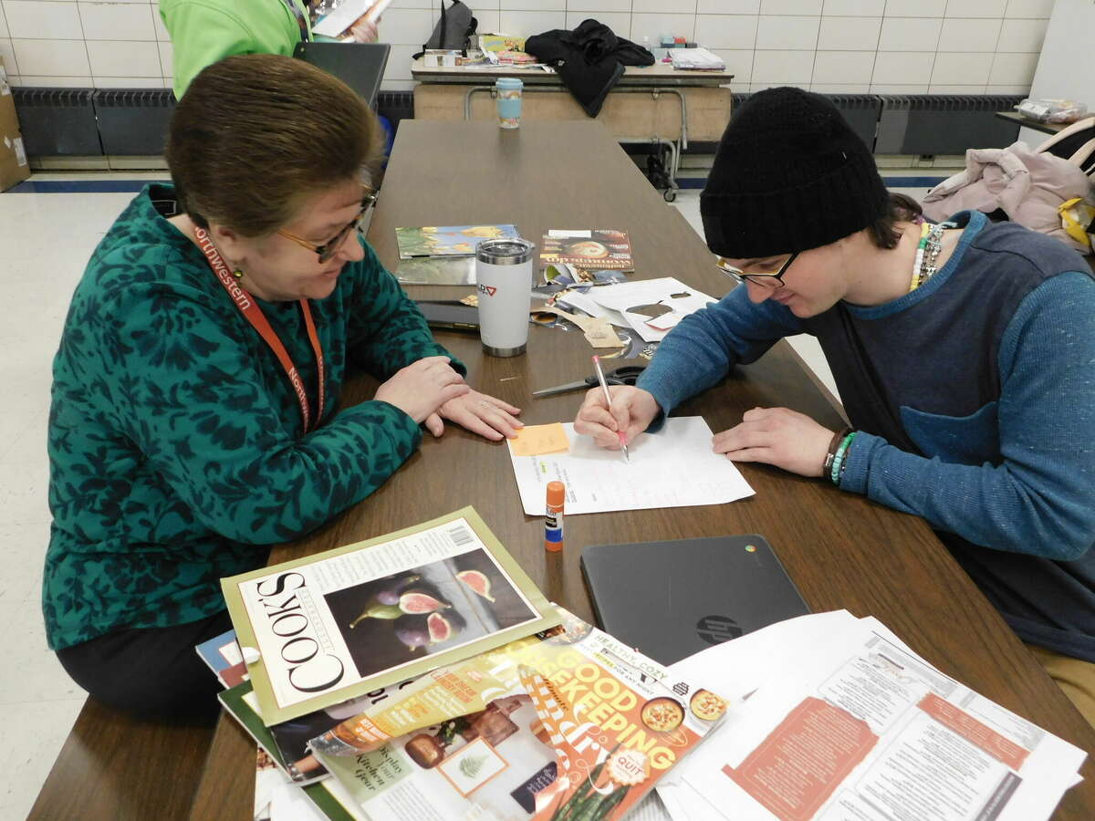 Valerie Richard, work site supervisor, left, works with Tyler Rae, 20, of Colebrook, a student at Highland Transition Academy, on a mural that will be displayed during an open house March 23, 5-7 p.m., at HTA's site at 55 Oak St., Winsted.