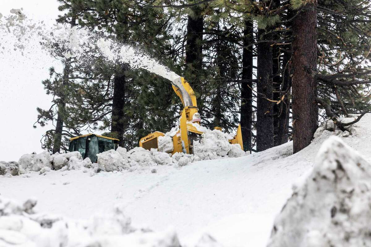 A snowblower removes snow at the Tahoe City Golf Course in Tahoe City (Placer County) on Tuesday.