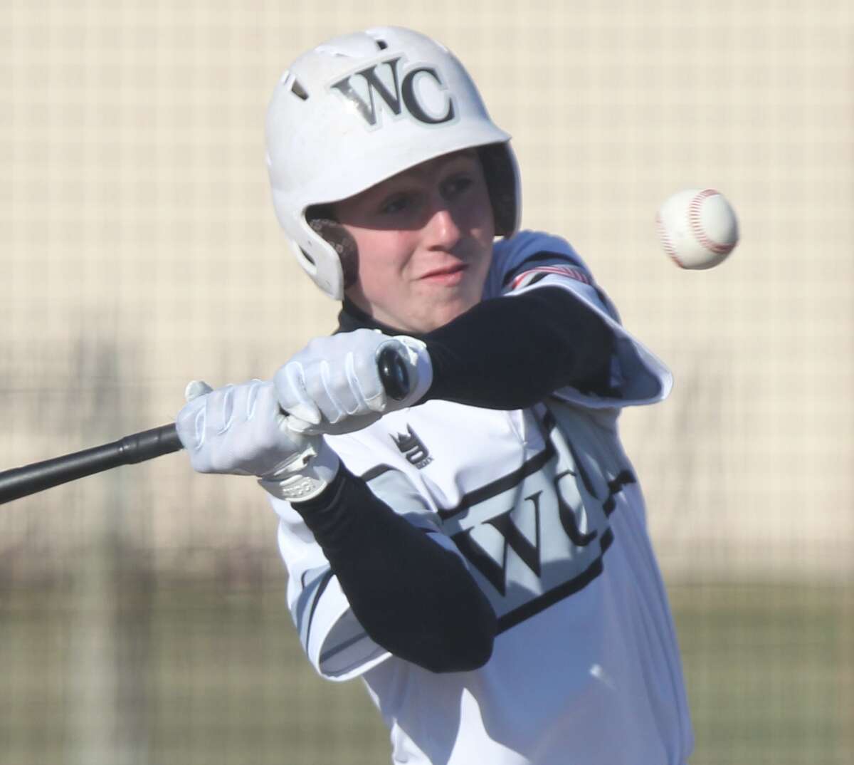 Action from the West Central baseball team's win over Carrollton in Tuesday's season opener at Winchester