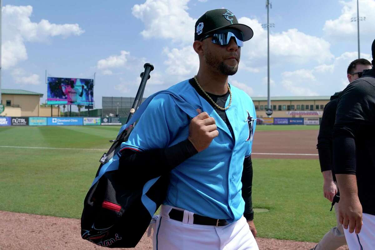 Miami Marlins' Yuli Gurriel walks to the dugout before a spring training baseball game against the New York Mets, Monday, March 13, 2023, in Jupiter, Fla. (AP Photo/Lynne Sladky)