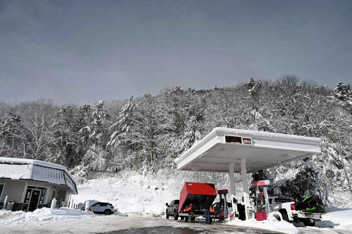 Snowmobilers fill up with gas at the Stewart’s Shops on Route 443 at 85 on Wednesday, March 15, 2023, in New Scotland, N.Y.