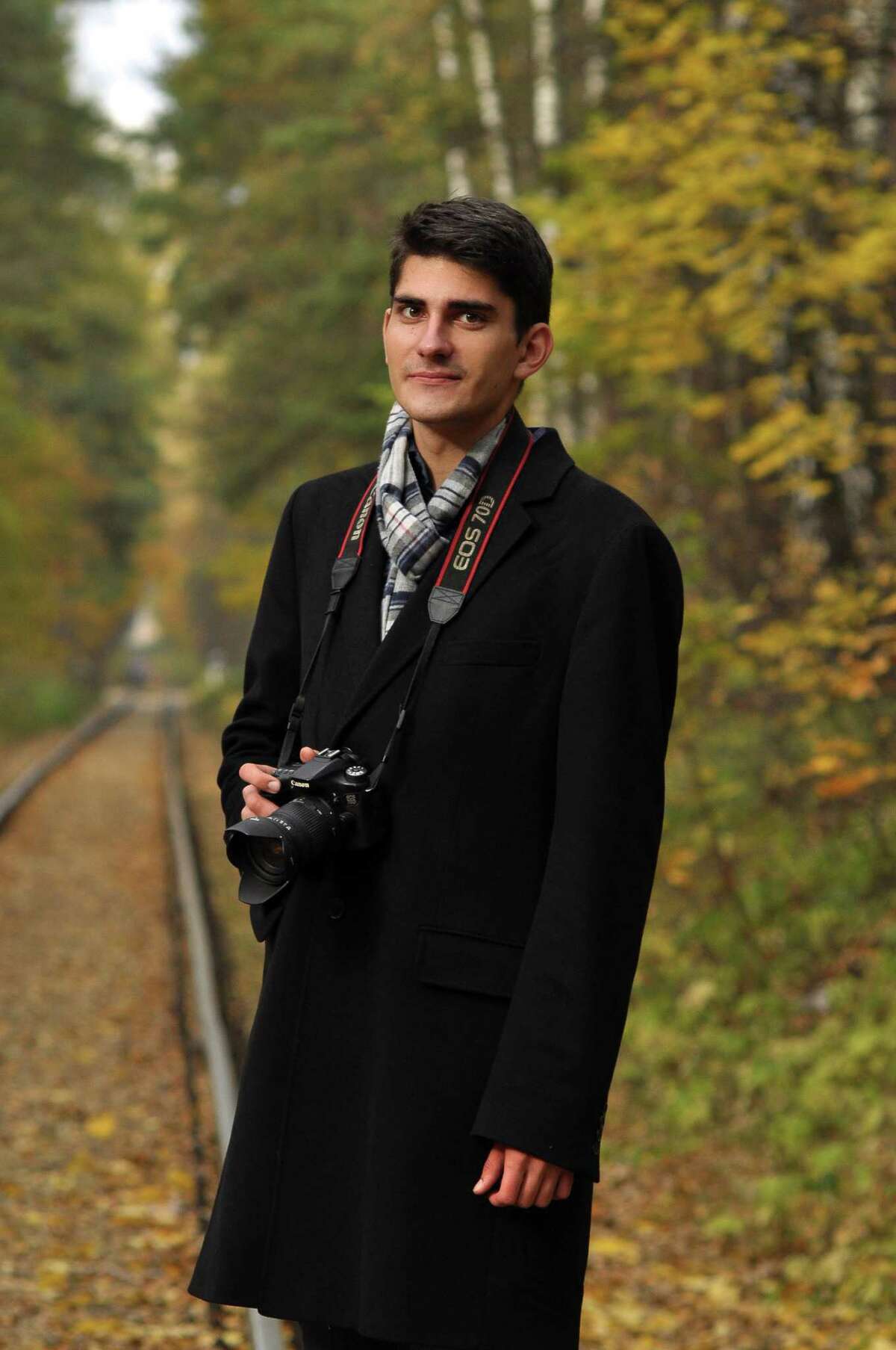 "Trainspotter" Mikhail Korotkov poses for a portrait in an undisclosed location.