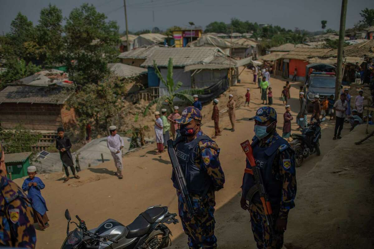 Police guard the Kutupalong Rohingya refugee camp in Cox's Bazar, Bangladesh, on Feb. 12, 2023.