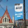 A banner hangs from a pole on State St. ahead of the NCAA basketball tournament held at the MVP Arena on Wednesday, March 15, 2023 in Albany, N.Y.